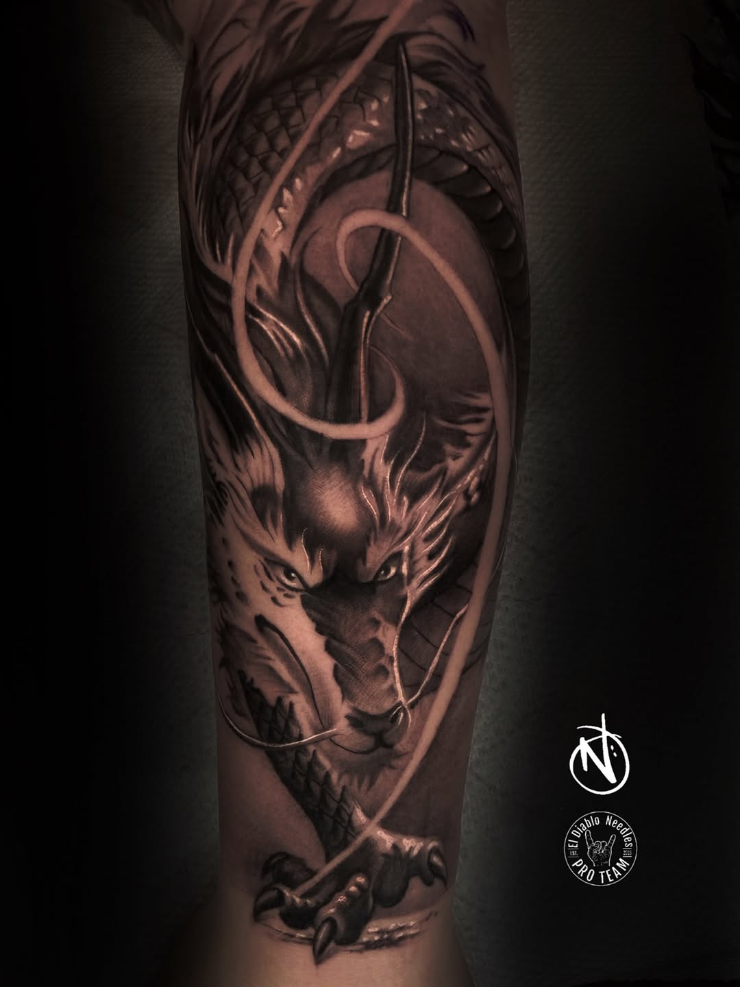 Dark realism tattoo with dramatic shading