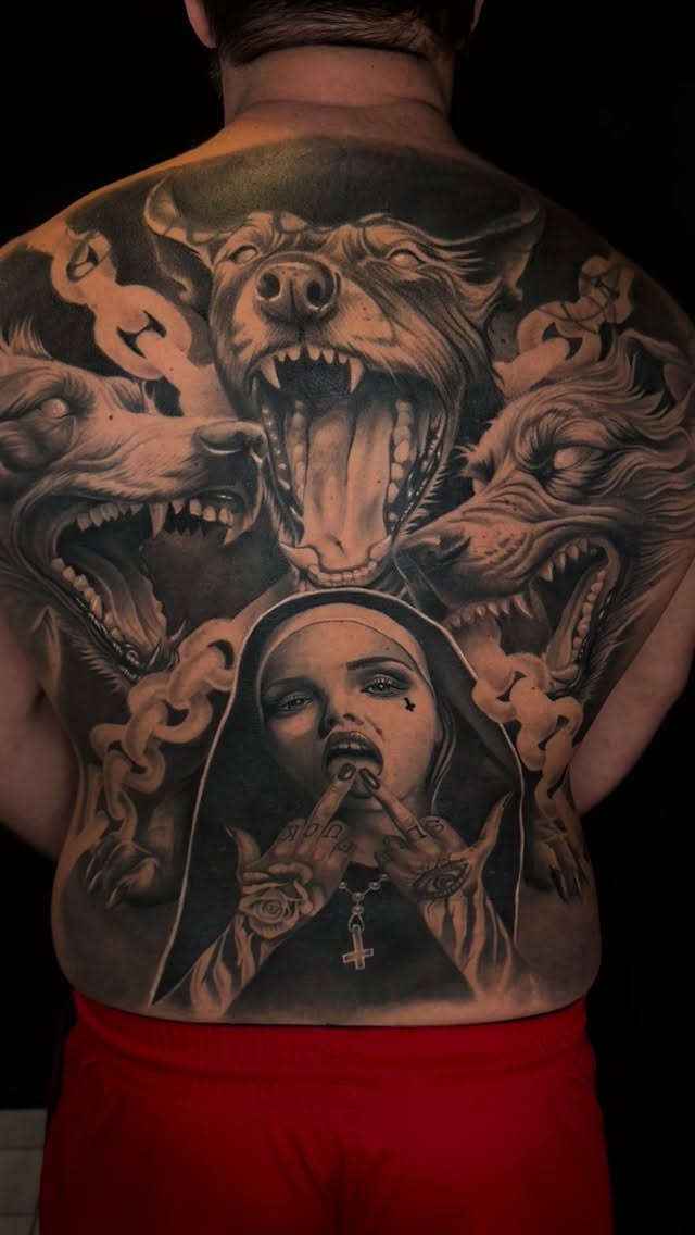 Full back piece — wolves and sacred imagery, by Nick Chan at Kreative Ink